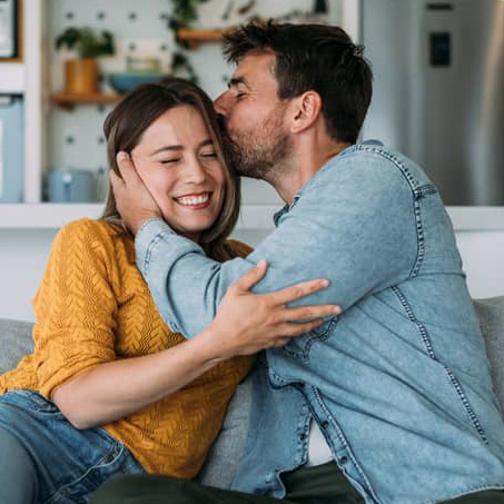 A couple embracing joyfully